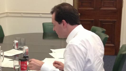 George Osborne putting final touches to a speech with the help of a Byron burger